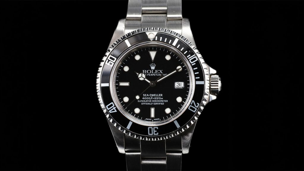 rolex sea dweller black background